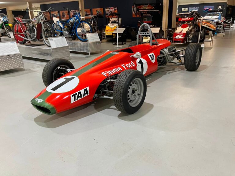 Two Very Different Exhibits Rolling to the Display at National Motor Racing Museum